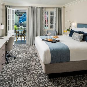 Premium Guest Room Balcony 1 King Bed Bourbon Street View